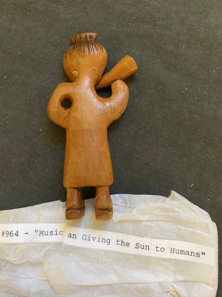 #4: "Musician Giving the Sun to Humans" back.